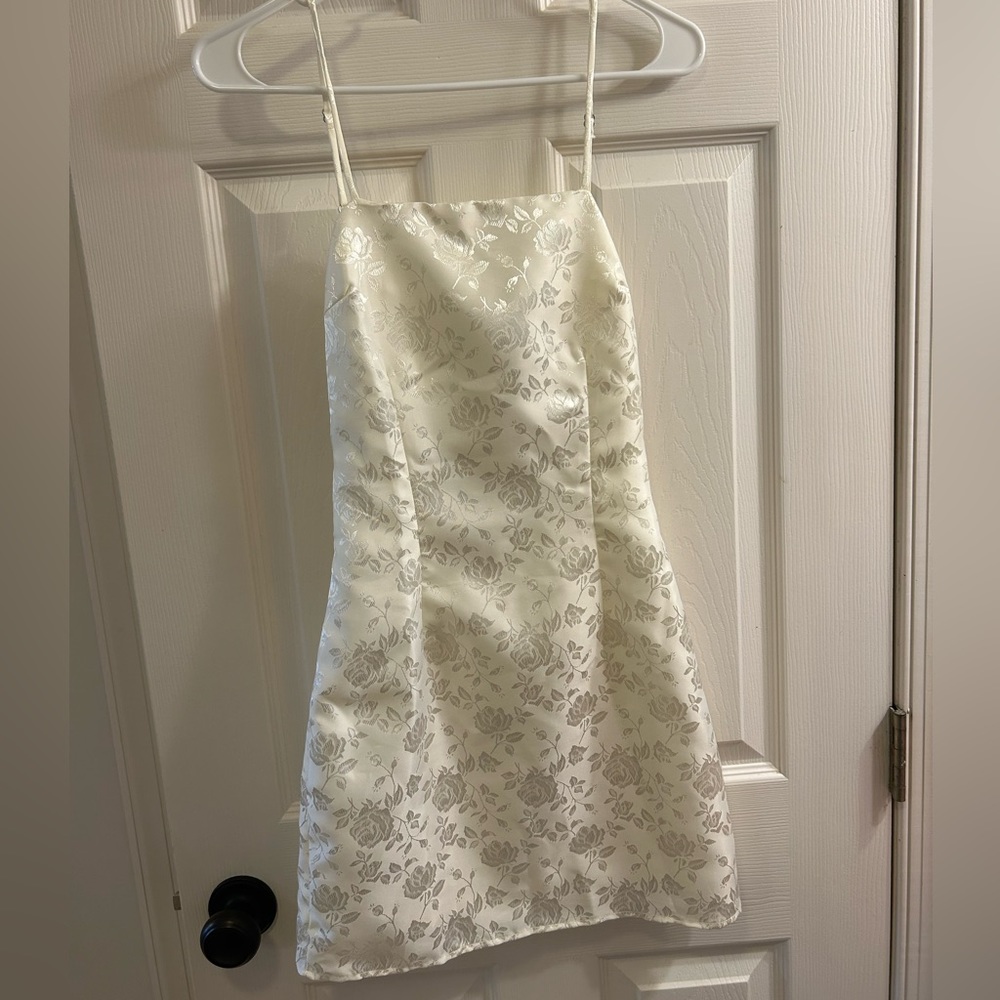 Off white Lucy in the Sky floral mini dress with open back, Size XS